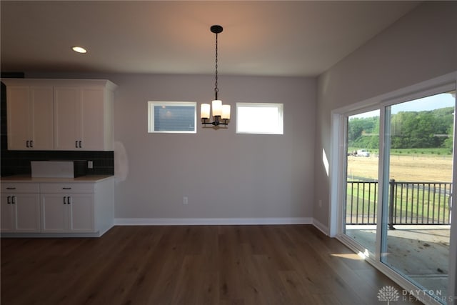 2855 Sky Crossing Dr Unit 50, Beavercreek, OH 45434 - unfurnished dining area with dark wood-type flooring, a chandelier, and recessed lighting