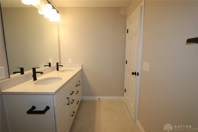 2855 Sky Crossing Dr Unit 50, Beavercreek, OH 45434 - bathroom with double vanity and tile patterned floors