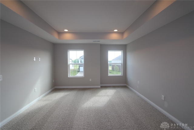 2855 Sky Crossing Dr Unit 50, Beavercreek, OH 45434 - unfurnished room with a tray ceiling, light carpet, and recessed lighting