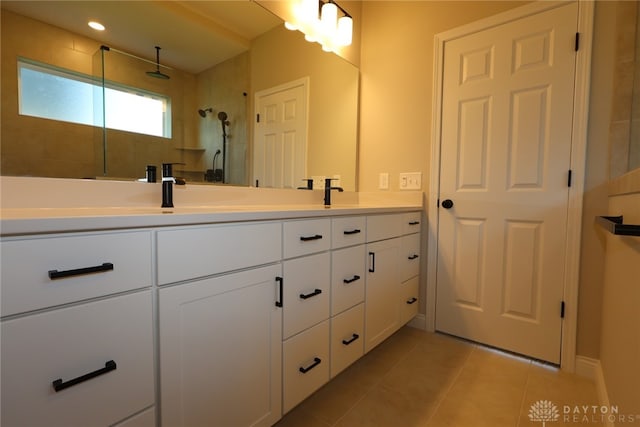 2855 Sky Crossing Dr Unit 50, Beavercreek, OH 45434 - full bathroom featuring double vanity, tile patterned flooring, and tiled shower