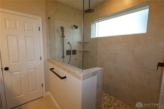 2855 Sky Crossing Dr Unit 50, Beavercreek, OH 45434 - bathroom featuring a walk in shower and tile patterned flooring