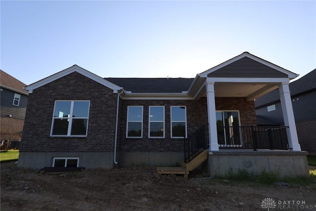 2855 Sky Crossing Dr Unit 50, Beavercreek, OH 45434 - view of side of property with brick siding and covered porch