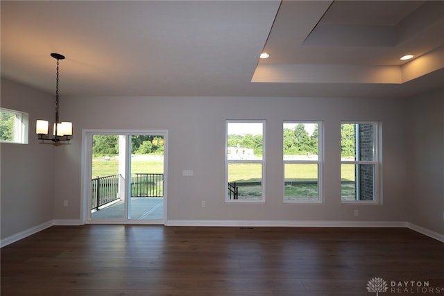 2855 Sky Crossing Dr Unit 50, Beavercreek, OH 45434 - unfurnished room featuring a tray ceiling, a chandelier, dark wood-type flooring, and recessed lighting