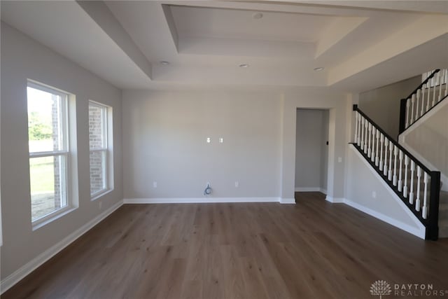 2855 Sky Crossing Dr Unit 50, Beavercreek, OH 45434 - empty room featuring a tray ceiling, wood finished floors, and stairway