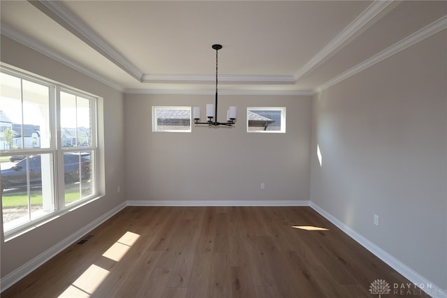 2855 Sky Crossing Dr Unit 50, Beavercreek, OH 45434 - unfurnished dining area featuring a chandelier, a tray ceiling, plenty of natural light, and crown molding