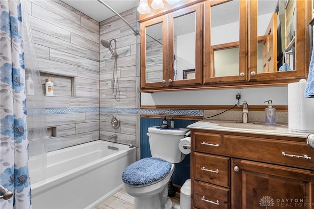 bathroom with vanity, toilet, and shower / tub combo with curtain