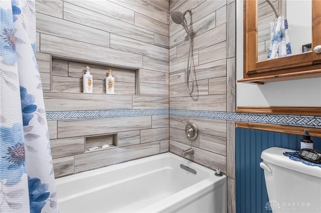 bathroom with shower / bath combo and toilet
