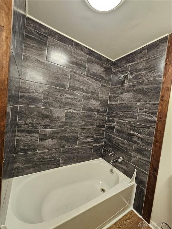 bathroom with shower / bathing tub combination