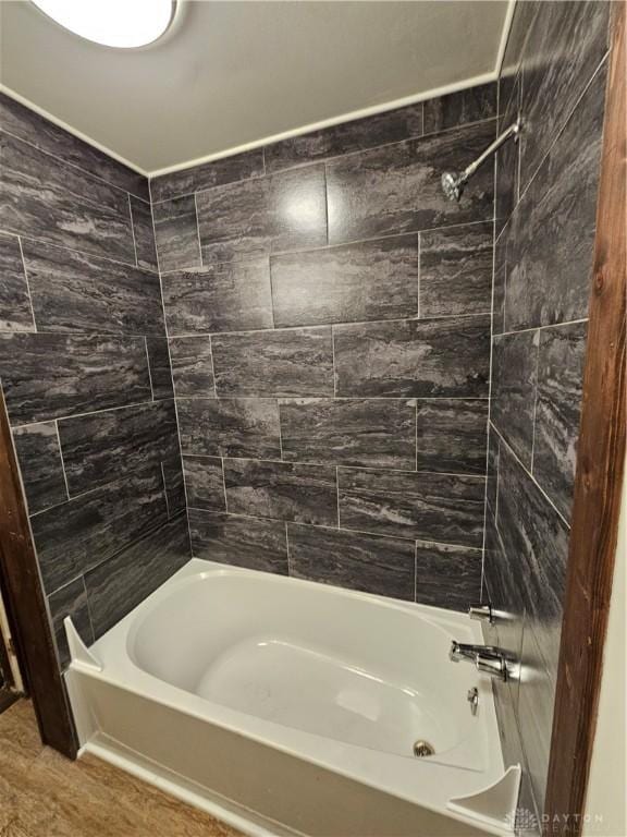 full bathroom featuring  shower combination