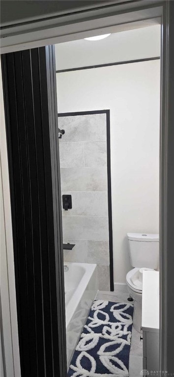 full bathroom with toilet, bathtub / shower combination, vanity, and tile patterned flooring
