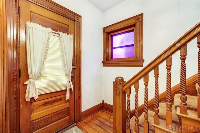 322 Hickory St, Dayton, OH 45410 - staircase featuring baseboards and wood finished floors
