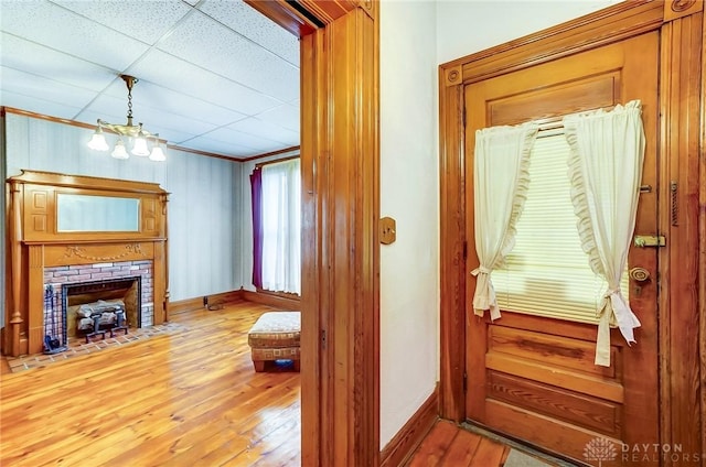 322 Hickory St, Dayton, OH 45410 - interior space with a notable chandelier, wood finished floors, and baseboards