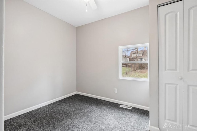 unfurnished bedroom featuring visible vents, ceiling fan, baseboards, and carpet floors