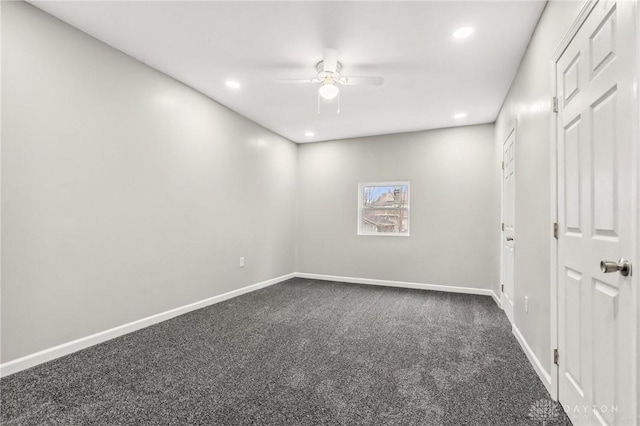 spare room with recessed lighting, a ceiling fan, baseboards, and dark carpet