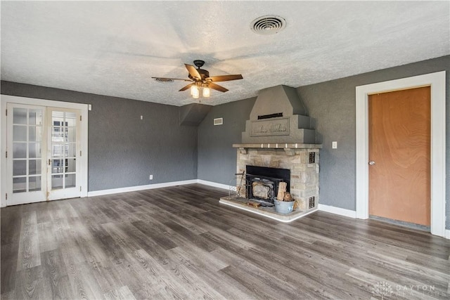4385 N Hyland Ave, Dayton, OH 45424 - unfurnished living room with wood finished floors, baseboards, visible vents, ceiling fan, and a textured ceiling