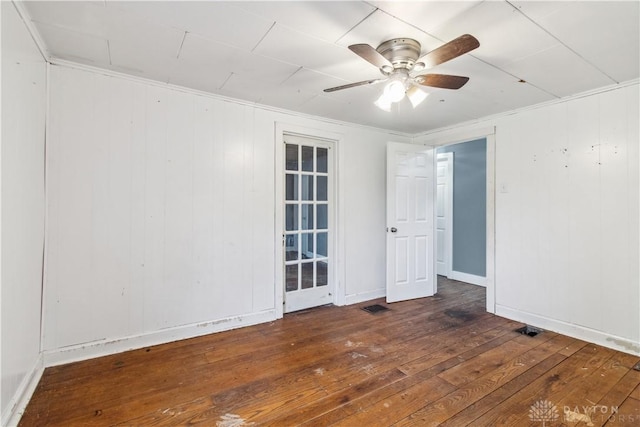 4385 N Hyland Ave, Dayton, OH 45424 - unfurnished room with visible vents, baseboards, ornamental molding, hardwood / wood-style flooring, and a ceiling fan