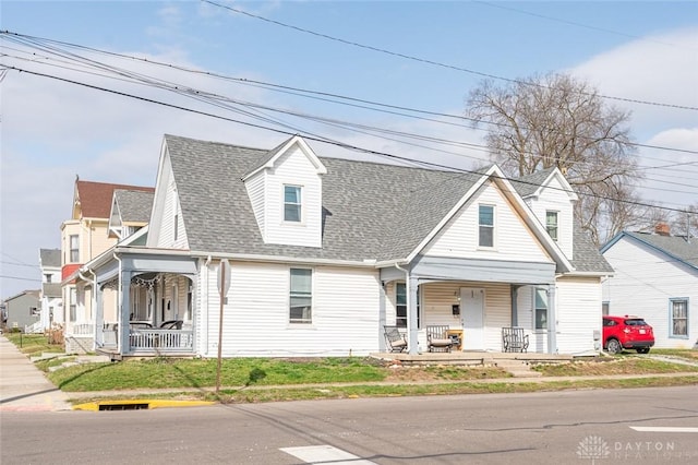131 S Mulberry St, Troy, OH 45373 - view of front of house with a porch and roof with shingles