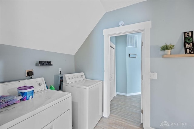 131 S Mulberry St, Troy, OH 45373 - laundry area featuring washer and clothes dryer and light wood-style floors
