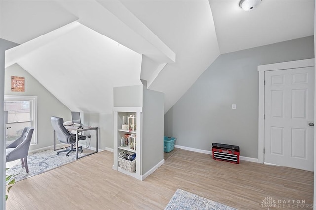 131 S Mulberry St, Troy, OH 45373 - home office featuring vaulted ceiling, wood finished floors, and built in features