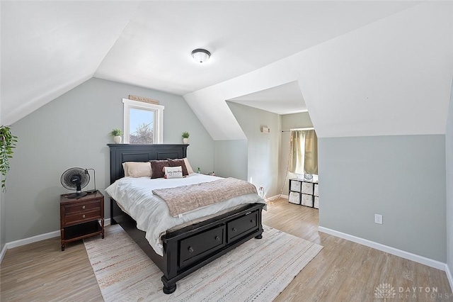 131 S Mulberry St, Troy, OH 45373 - bedroom featuring light wood-style floors and vaulted ceiling