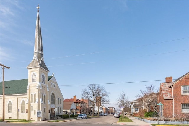 131 S Mulberry St, Troy, OH 45373 - view of asphalt road featuring sidewalks, curbs, and a residential view