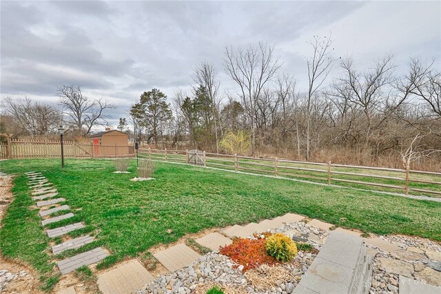 view of yard with fence