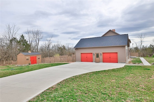 exterior space featuring fence and concrete driveway