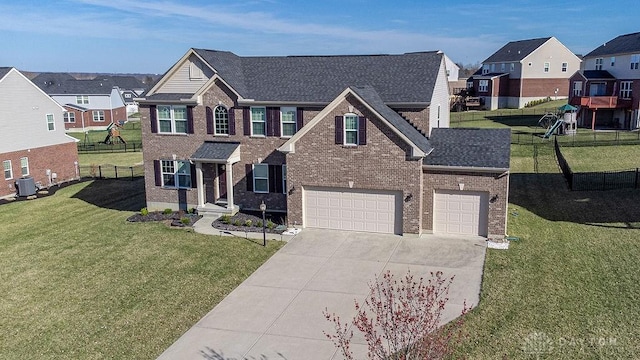 view of front of property with brick siding, a front lawn, fence, central air condition unit, and driveway