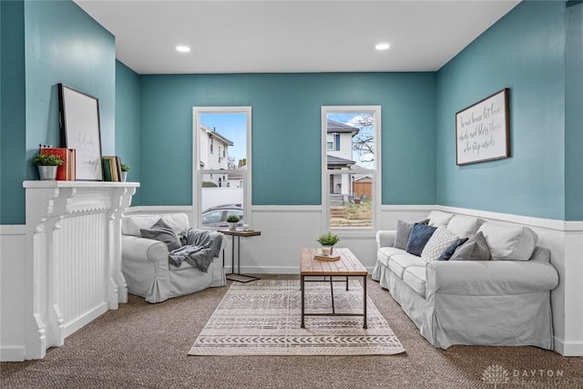 1546 W 1st St, Dayton, OH 45402 - living area with carpet, a wainscoted wall, and recessed lighting