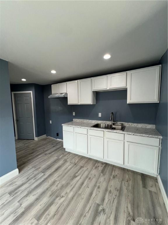 225 Victor Ave, Dayton, OH 45405 - kitchen with a sink, baseboards, light wood-style flooring, and recessed lighting