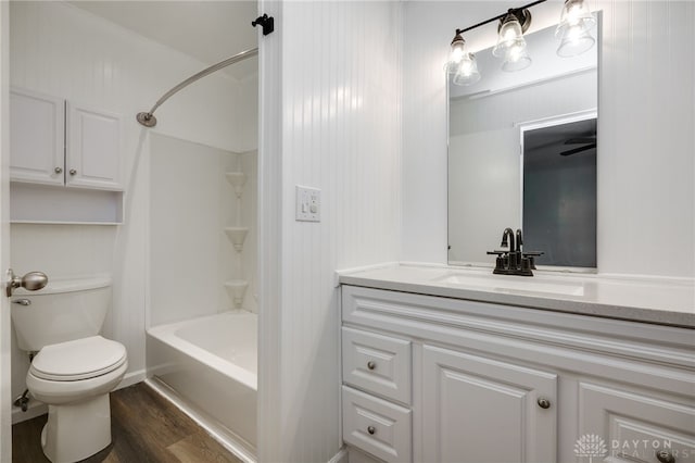 6407 Kindred Sq Unit 9-4, Dayton, OH 45449 - bathroom with wood finished floors, vanity, toilet, and shower / washtub combination