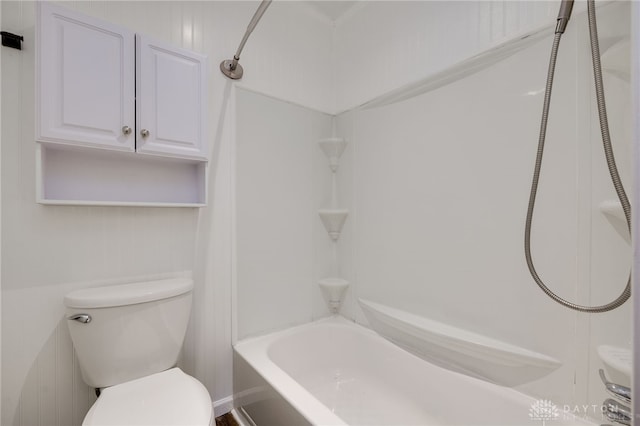 bathroom featuring toilet and tub / shower combination