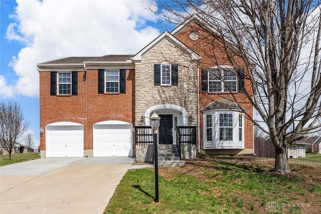 1315 Sierra Ridge Dr, Miamisburg, OH 45342 - view of front of home featuring brick siding, concrete driveway, a front lawn, and an attached garage