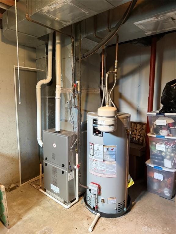 utility room with water heater