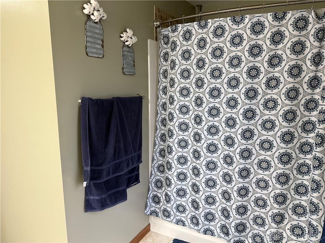 full bath featuring curtained shower