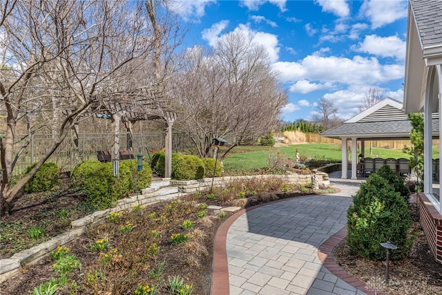 view of yard with a patio and a gazebo