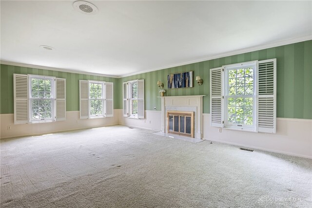 533 Lockerbie Ln, Kettering, OH 45429 - unfurnished living room with ornamental molding, carpet flooring, healthy amount of natural light, and a high end fireplace