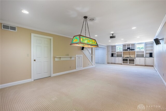 533 Lockerbie Ln, Kettering, OH 45429 - basement with light colored carpet, baseboards, recessed lighting, crown molding, and stairway