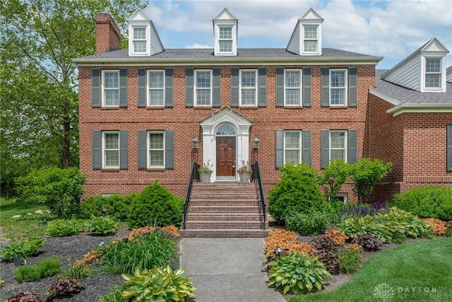 533 Lockerbie Ln, Kettering, OH 45429 - georgian-style home with brick siding and a chimney