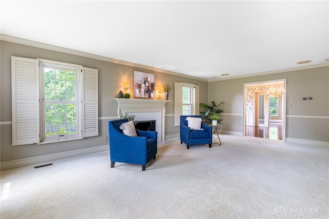 533 Lockerbie Ln, Kettering, OH 45429 - sitting room with crown molding, carpet, a fireplace, and baseboards