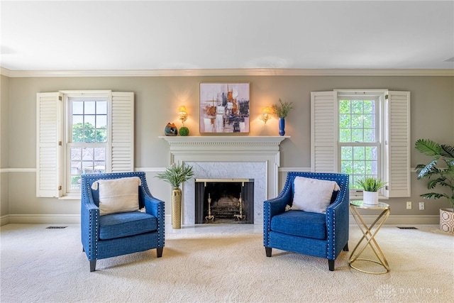 533 Lockerbie Ln, Kettering, OH 45429 - living area with carpet flooring, crown molding, a premium fireplace, and baseboards