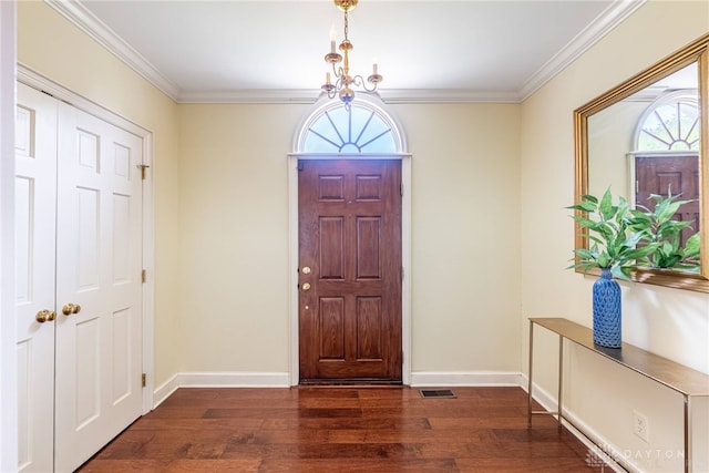 533 Lockerbie Ln, Kettering, OH 45429 - entrance foyer featuring wood finished floors, crown molding, and baseboards