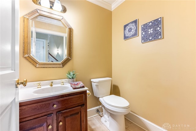 533 Lockerbie Ln, Kettering, OH 45429 - bathroom featuring vanity, toilet, tile patterned flooring, baseboards, and crown molding