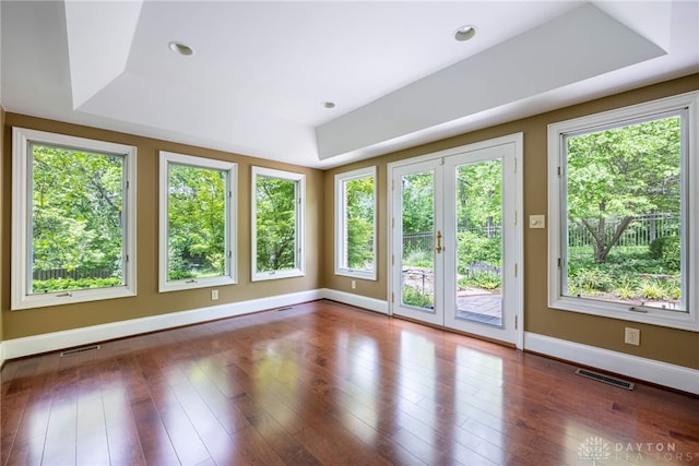 533 Lockerbie Ln, Kettering, OH 45429 - empty room with a raised ceiling, baseboards, wood finished floors, french doors, and recessed lighting