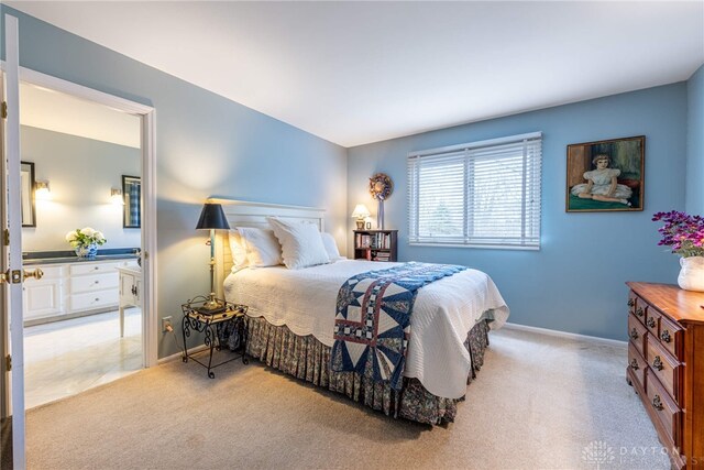 533 Lockerbie Ln, Kettering, OH 45429 - bedroom with light colored carpet and baseboards