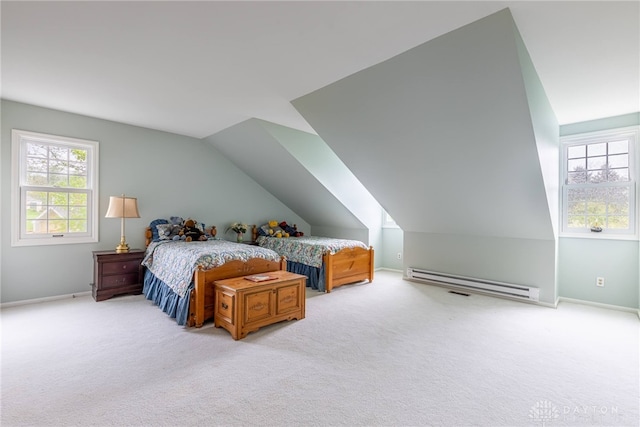 533 Lockerbie Ln, Kettering, OH 45429 - carpeted bedroom with a baseboard radiator, lofted ceiling, and baseboards