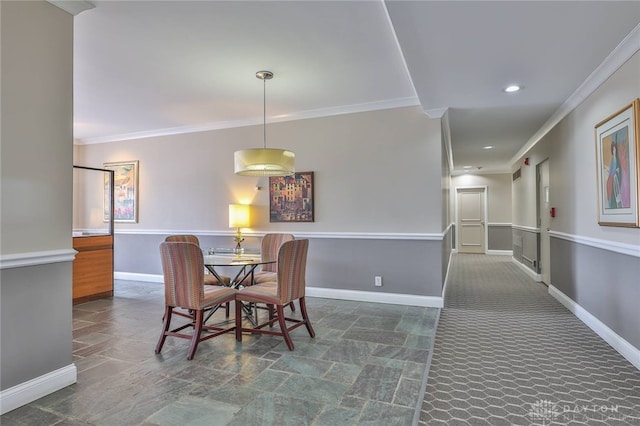 dining space featuring ornamental molding, recessed lighting, stone finish floor, and baseboards