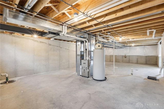 unfinished basement with heating unit and gas water heater