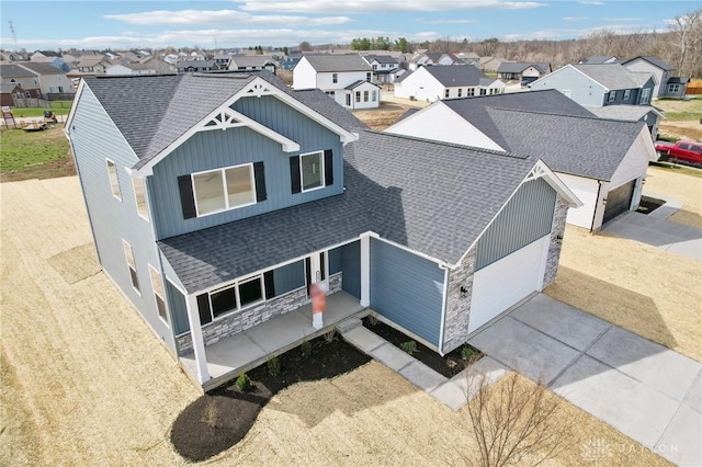 birds eye view of property featuring a residential view