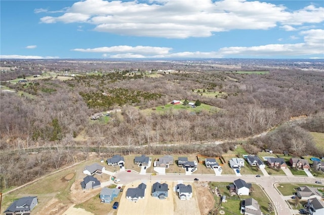 birds eye view of property with a residential view